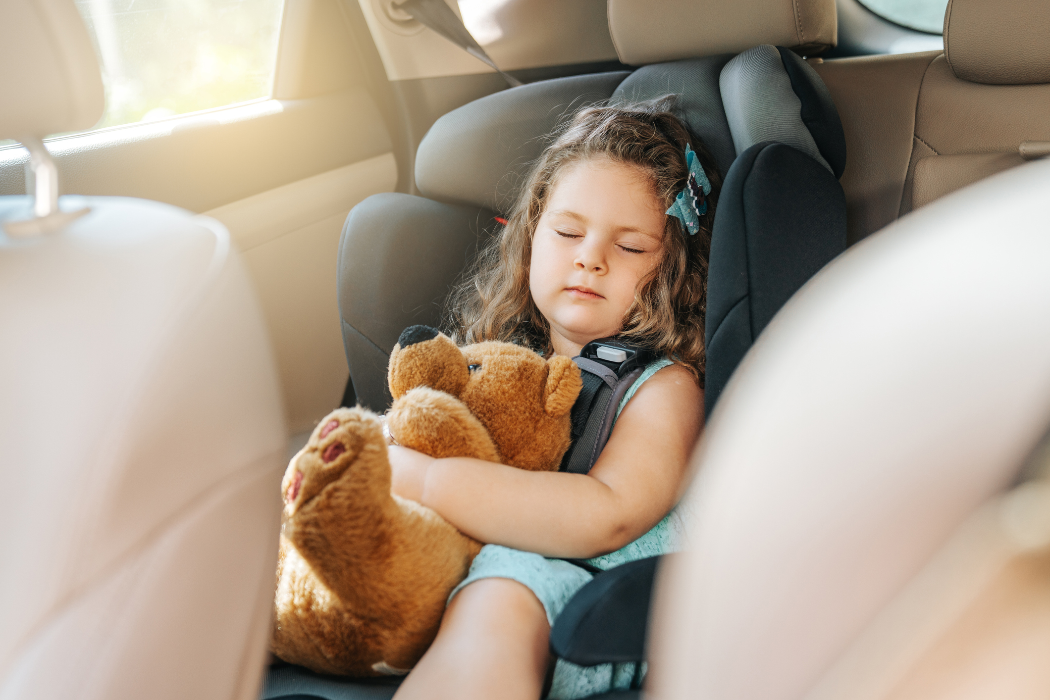 Child sleeping in car